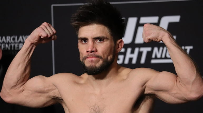 UFC flyweight champion Henry Cejudo weighs in ahead of UFC...