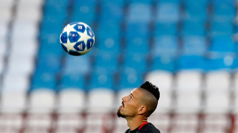 Napoli midfielder Marek Hamsik controls the ball during a training...
