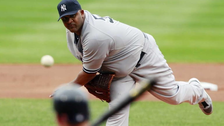 New York Yankees' CC Sabathia pitches in the first inning...