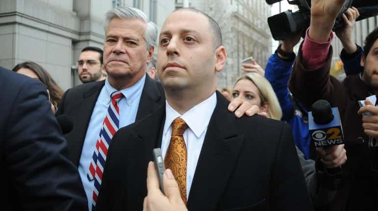Dean and Adam Skelos leave federal court in Manhattan after...