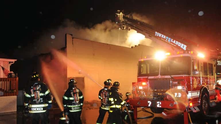 The Long Beach Fire Department, with the help of several...