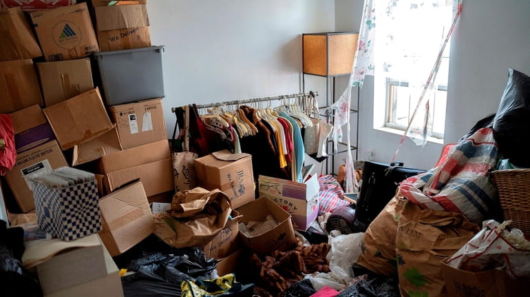 For hoarders, untangling a mess is not as simple as calling...
