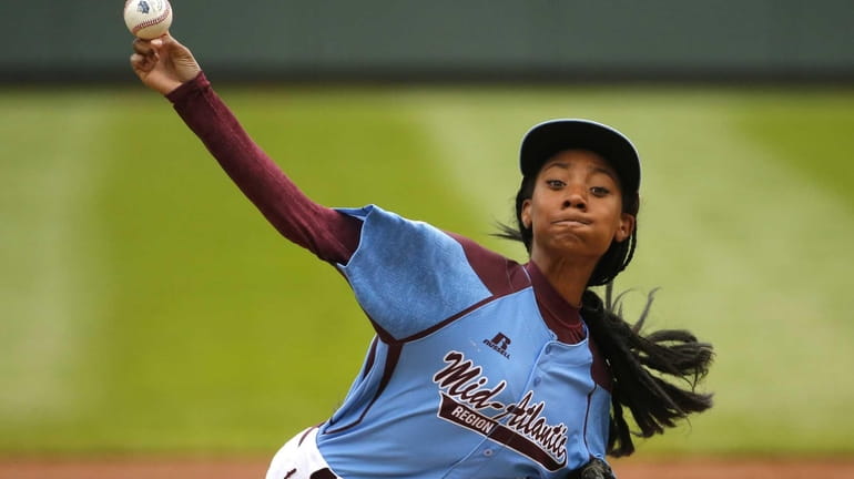 Pennsylvania's Mo'Ne Davis delivers in the first inning against Tennessee...