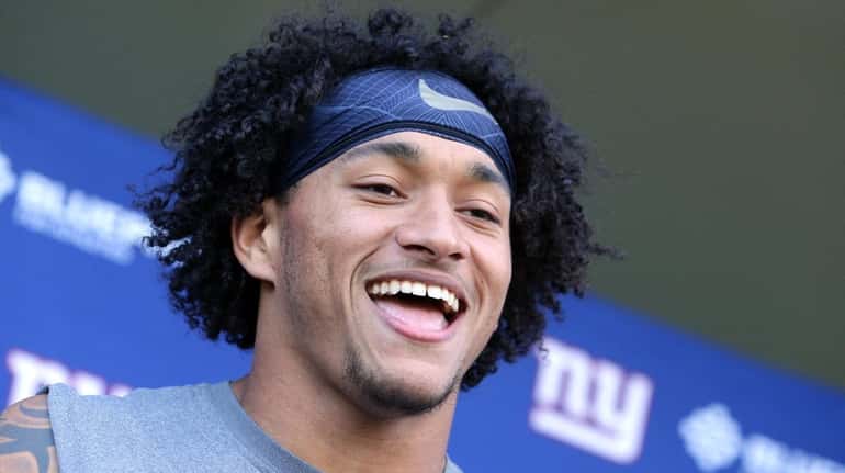 Giants tight end Evan Engram speaks with the media after...