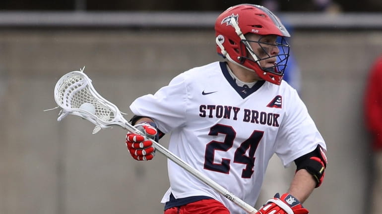 Stony Brook's Tom Dugan drives up field during the second...