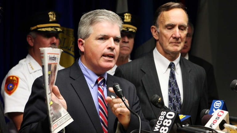 Suffolk County Executive Steve Bellone, with Police Commissioner Edward Webber...