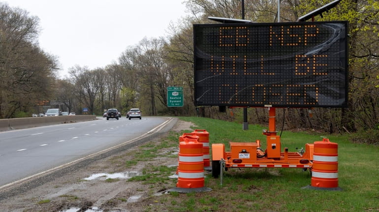 A road sign alerting drivers to the upcoming eastbound closure...
