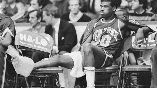 Knicks' Bernard King (30) grimaces after injuring his ankle in...