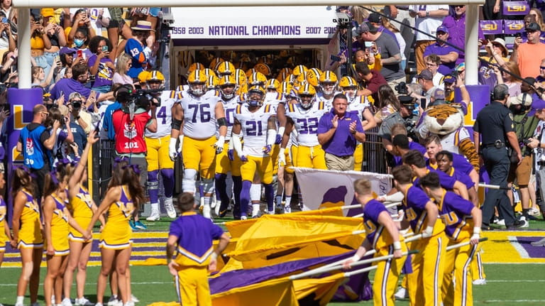 The LSU football team takes to the field against Florida...
