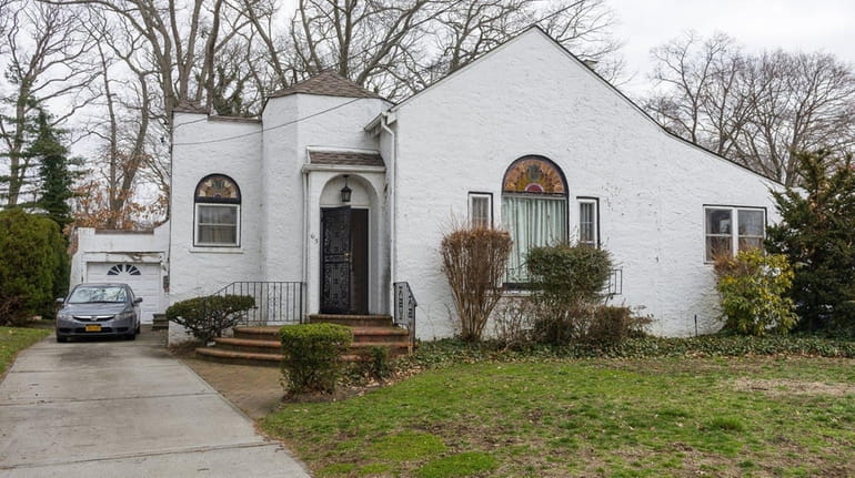 This circa-1928 stucco house in historic Merrick Gables neighborhood of...