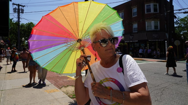 Peggy Elder of Massapequa enjoys the Babylon Village Pride Car Parade in...
