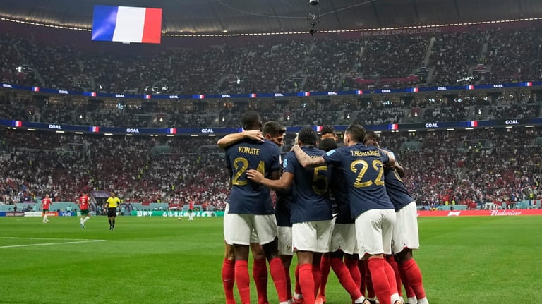France players celebrate after Theo Hernandez scored the opening goal...