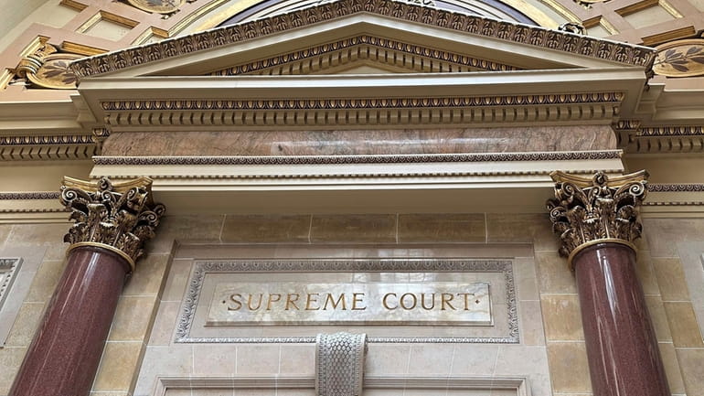 The entrance to the Wisconsin Supreme Court chambers is seen...