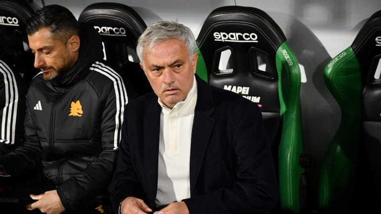 Roma's coach Jose Mourinho looks on ahead of the Italian...