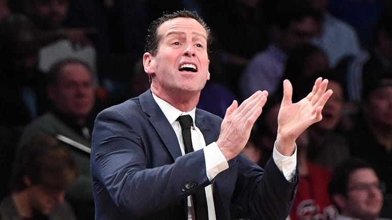 Nets head coach Kenny Atkinson gestures during the second half...