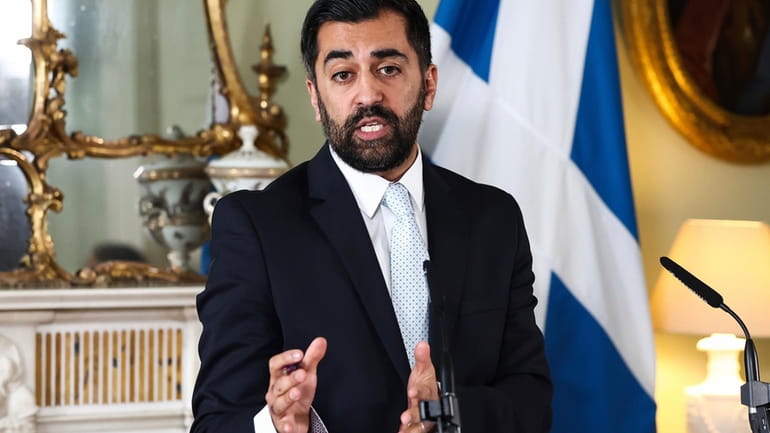 Scotland's First Minister Humza Yousaf speaks during a press conference...