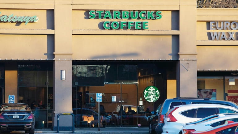 The Starbucks at 6 Great Neck Rd. is shown.
