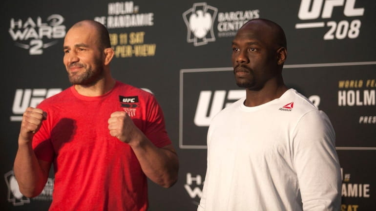 Glover Teixeira, left, and Jared Cannonier face off in a...
