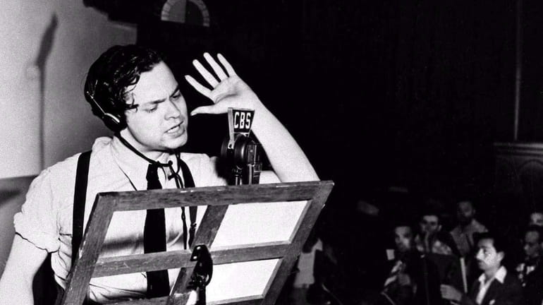 Orson Welles reads from his script in the 1938 broadcast...