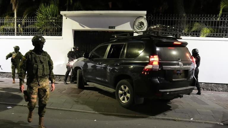 Police attempt to break into the Mexican embassy in Quito,...