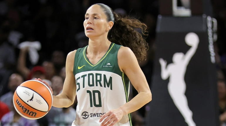 Sue Bird of the Seattle Storm brings the ball up...