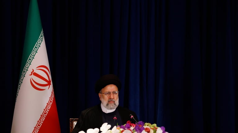 President of Iran Ebrahim Raisi holds a news conference, Wednesday,...