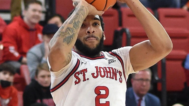 Julian Champagnie of St. John's shoots a jumper during the...
