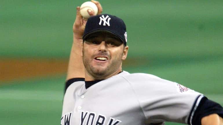 Yankees pitcher Roger Clemens throws in the first inning against the...
