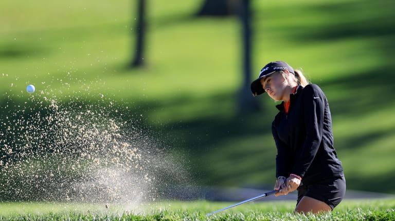 FILE - Gianna Clemente hits out of a bunker on...