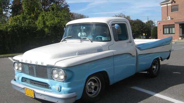 This custom 1958 Dodge D100 features grafted 1957 DeSoto fins...
