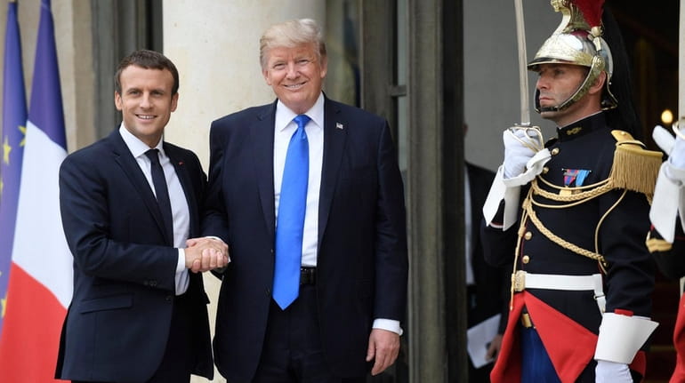 French President Emmanuel Macron received President Donald Trump in Paris...