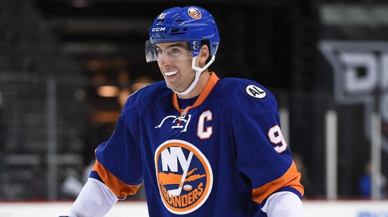 New York Islanders center John Tavares looks on against the...