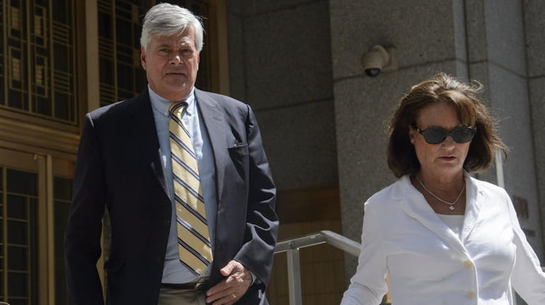 Dean Skelos, left, and his wife, Gail, leave federal court in...