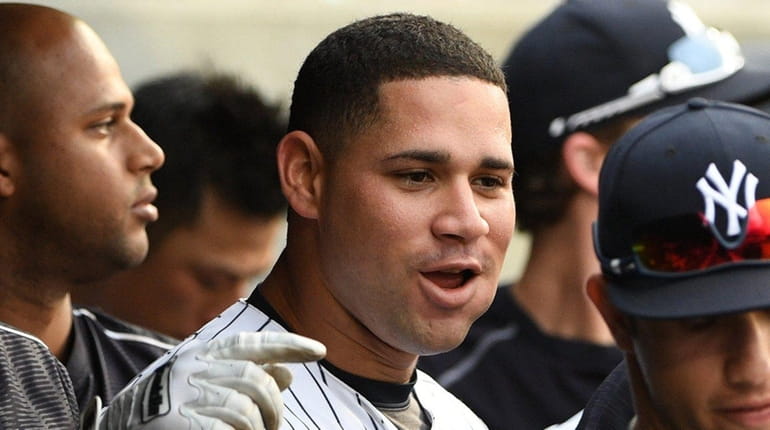 New York Yankees catcher Gary Sanchez looks on in the...