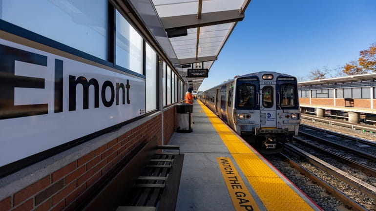 The first LIRR train arrives at the new Elmont-UBS Arena station...