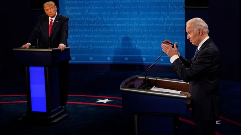 Democratic presidential candidate former Vice President Joe Biden, right, answers...