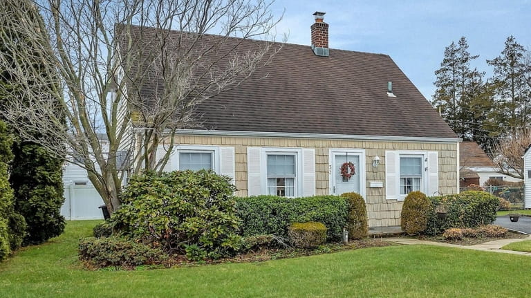 This Levittown Cape contains three bedrooms.