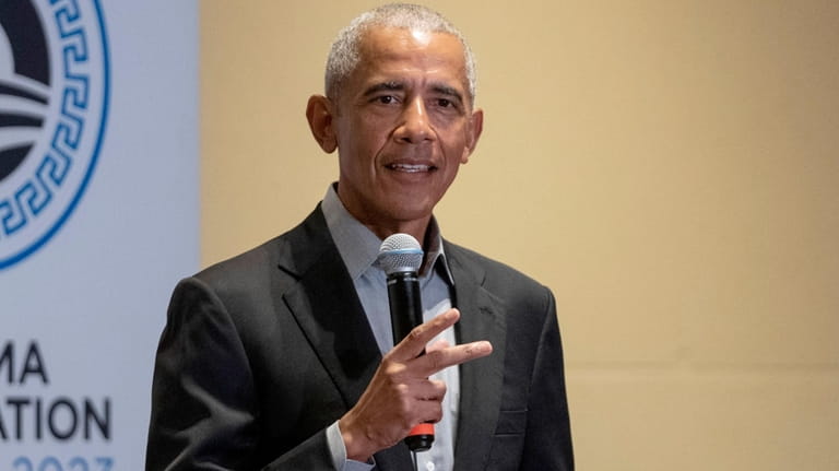 Former President Barack Obama speaks to the members of the...