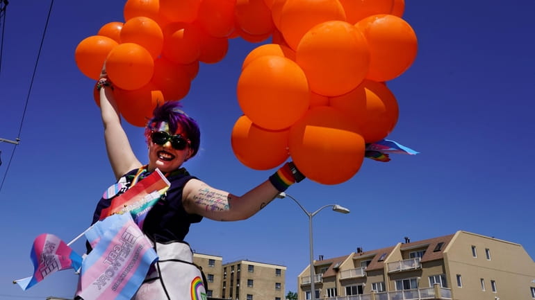 A reveler at the 2019 Pride parade celebration in Long Beach. The...