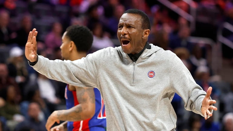 Detroit Pistons coach Dwane Casey argues with an official during...
