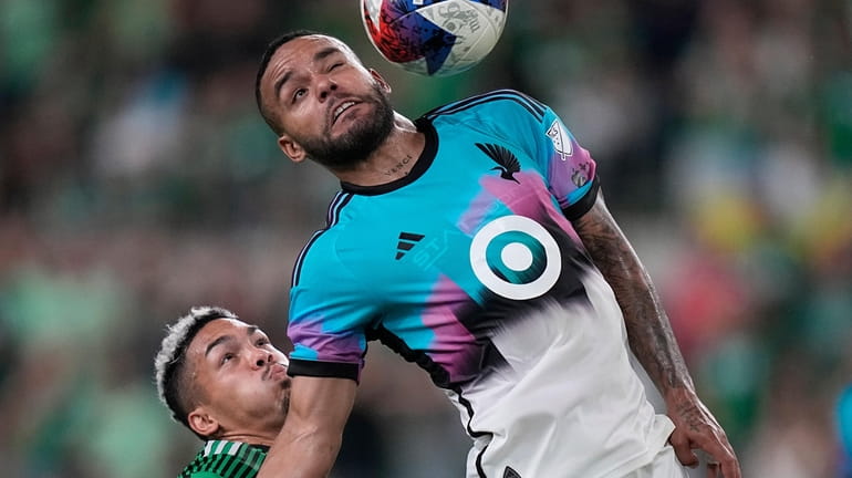 Minnesota United defender D.J. Taylor (27) works with the ball...
