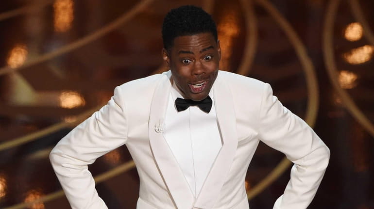 Oscars host Chris Rock on stage during the 88th Oscars...