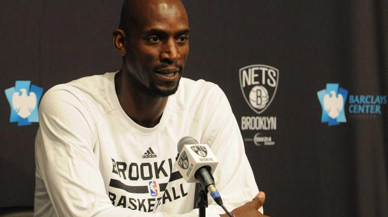 Kevin Garnett speaks to reporters during the Nets' annual Media...