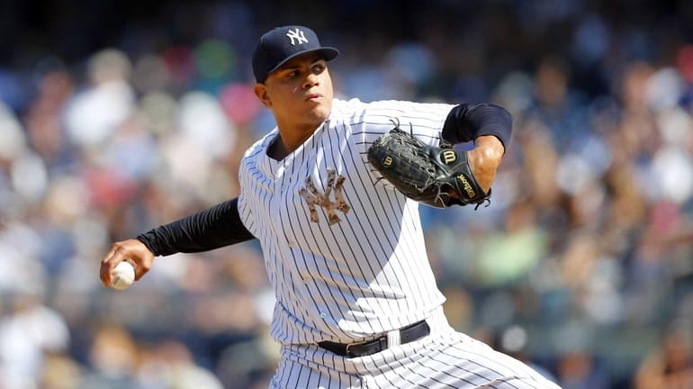 Dellin Betances of the Yankees pitches in the eighth inning...