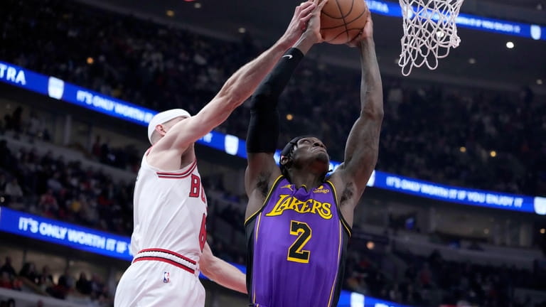 Los Angeles Lakers' Jarred Vanderbilt drives to the basket as...