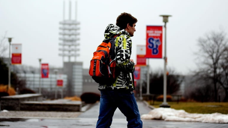Students walk to class on Stony Brook University's main campus...