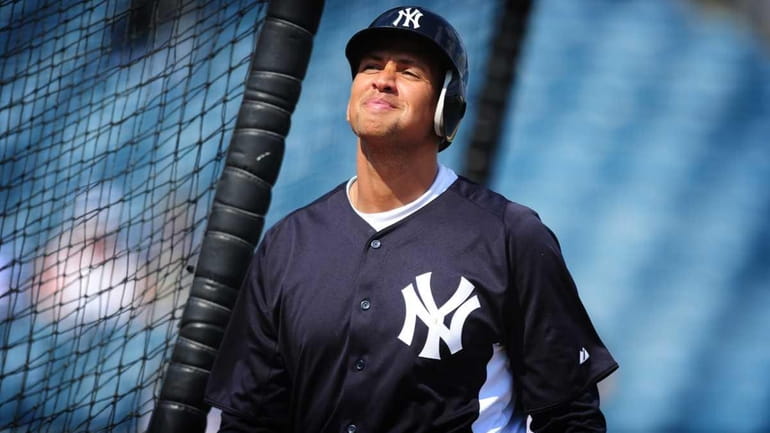Yankees third baseman Alex Rodriguez takes batting practice during spring...