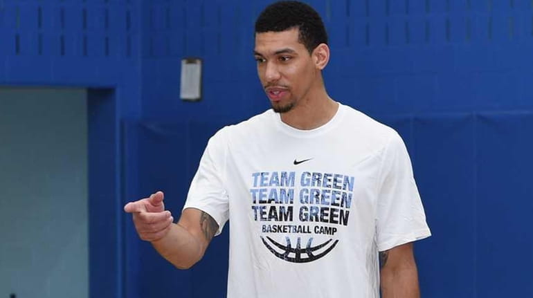Danny Green, of the NBA's San Antonio Spurs, speaks with...