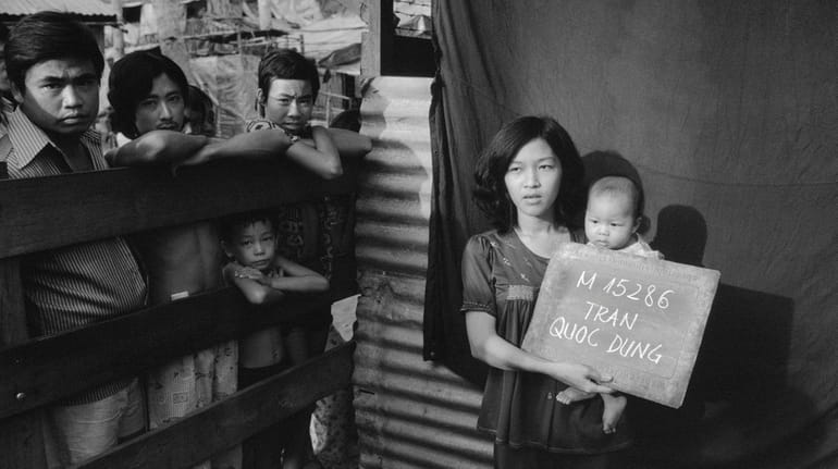 Vietnamese refugees hoping to go to the United States passed...