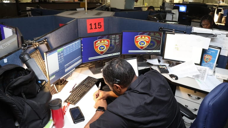 An emergency operator receives a 911 call at Suffolk County...